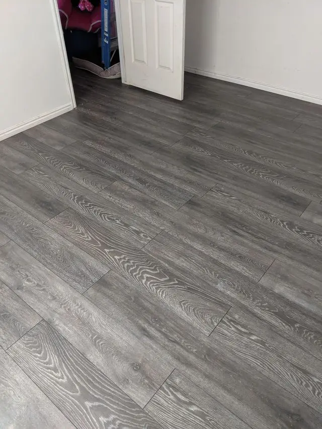 After: real finished plank flooring from the same job