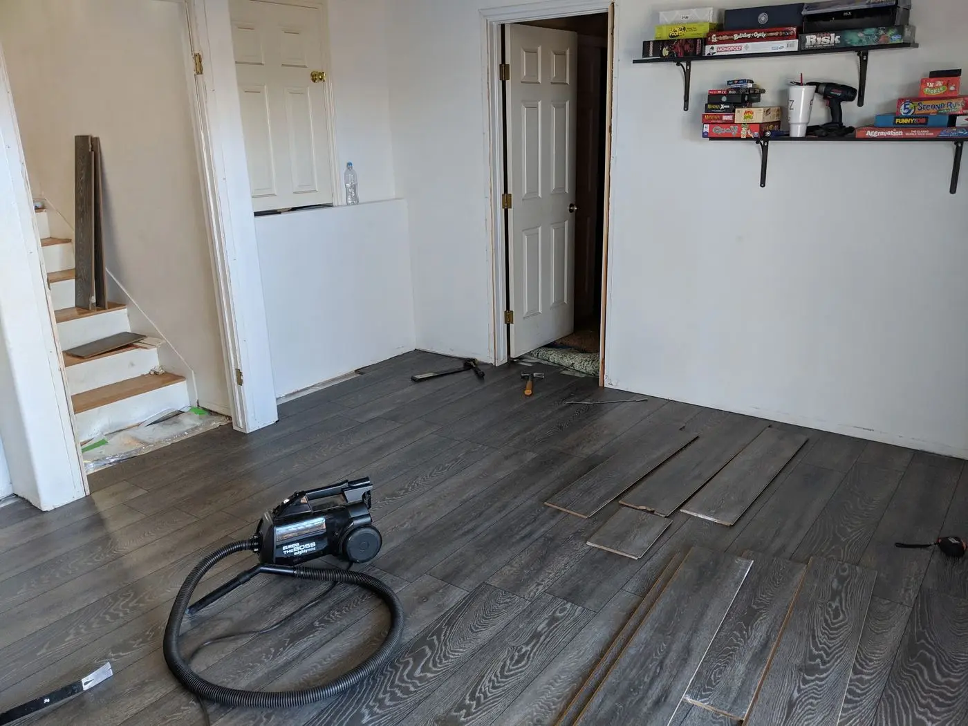 Plank flooring installation in progress