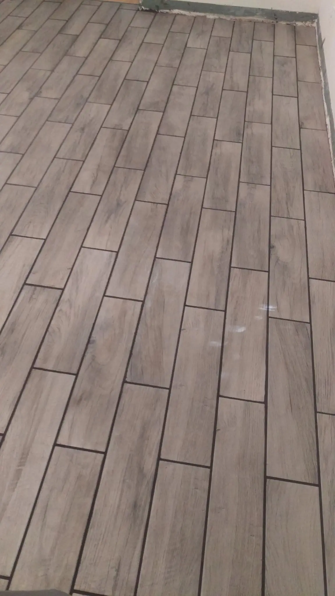 Finished tile flooring