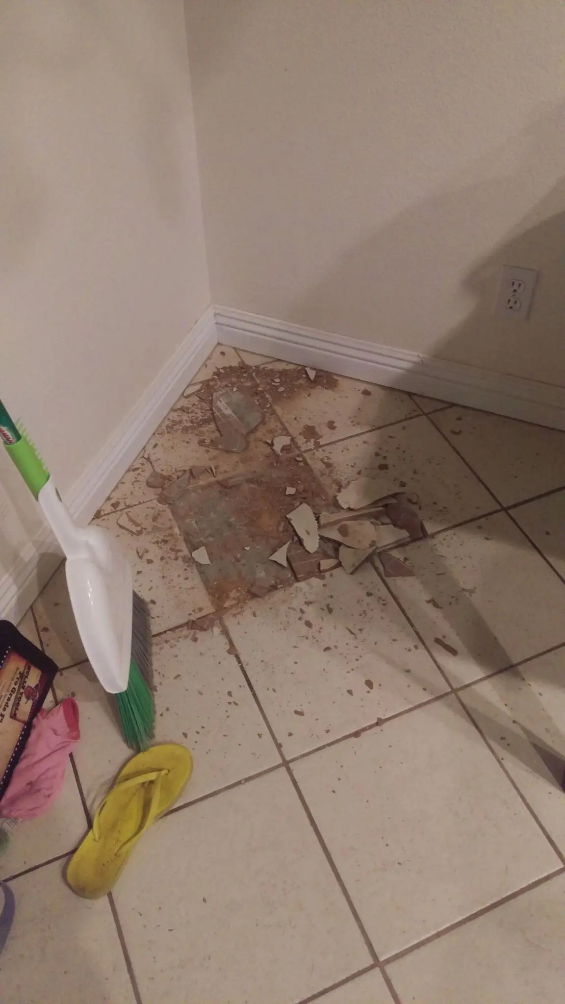 Damaged tile ready for repair